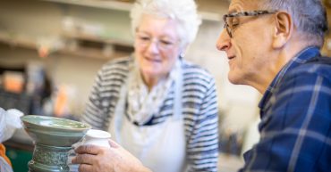 Man and woman in pottery class