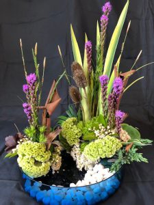 Floral arrangement - green and purple