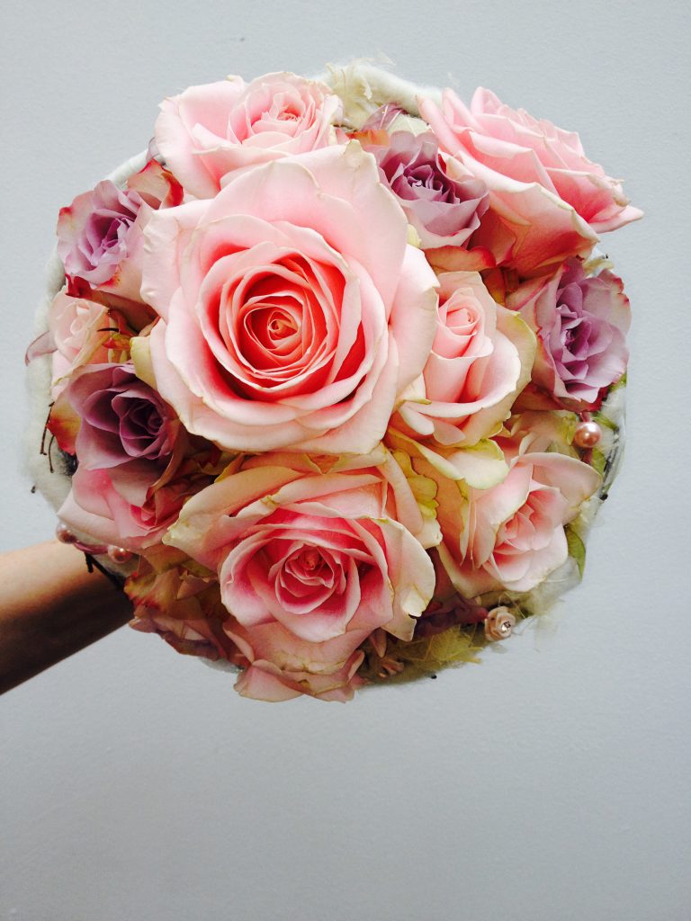 Circular bouquet with pink roses