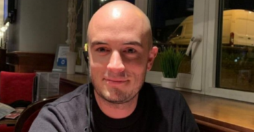 Man in grey t-shirt