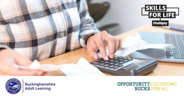 Number confidence week image person using a calculator
