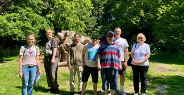Group of learners and tutors at park