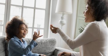 Mother and child using sign language