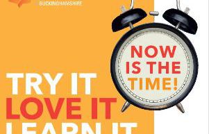 Try It, Love It, Learn It logo with orange clock