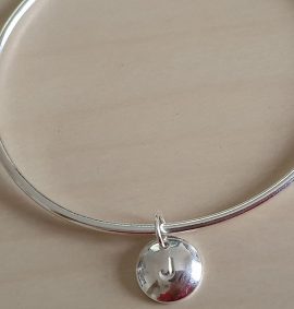 silver charm bangle with pendant