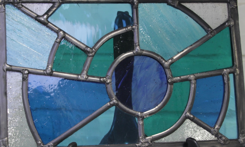 Blue and green stained glass window